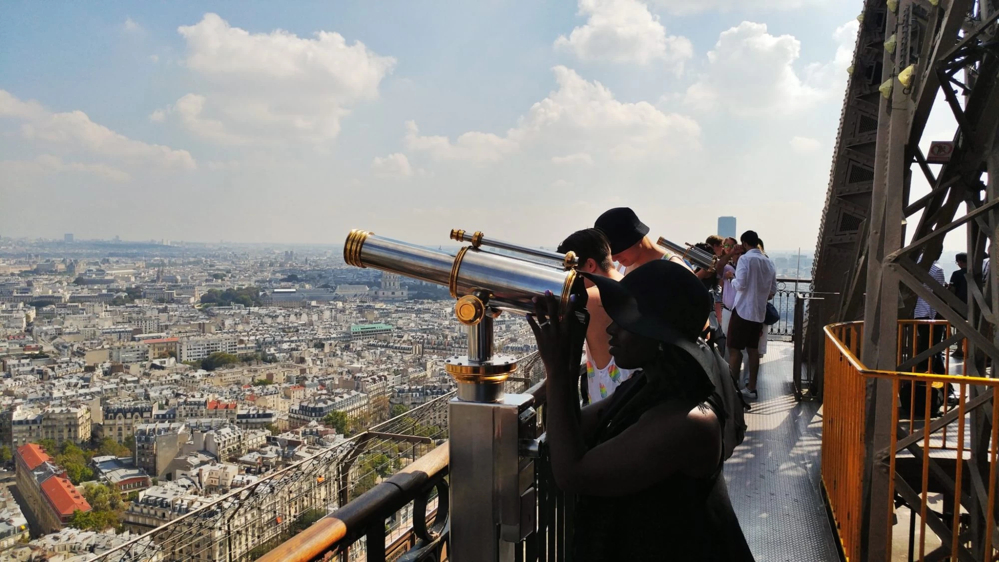 Shylo looking at the view from the top of the Eiffel tower in Paris