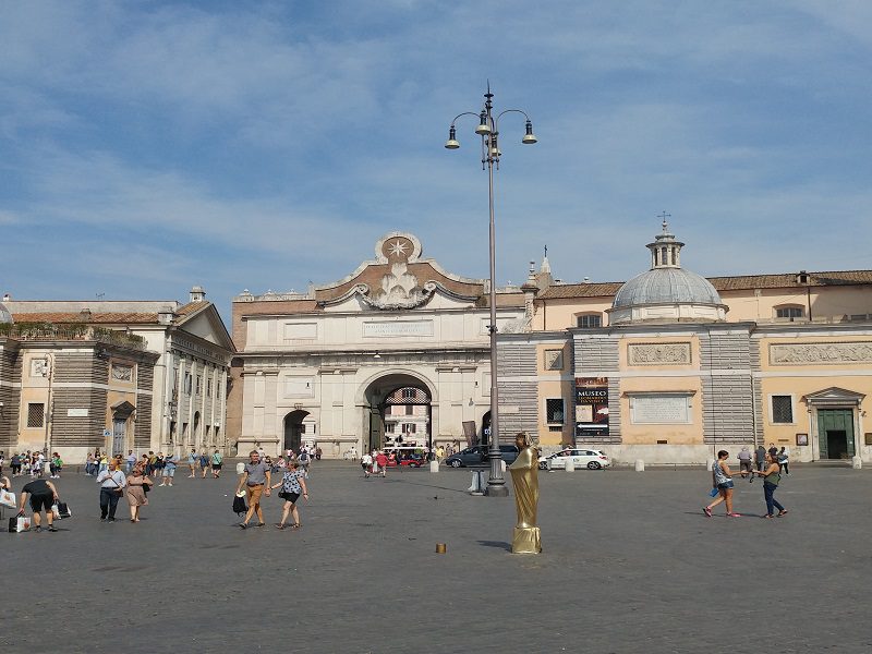 Porta del Popolo and a gold man