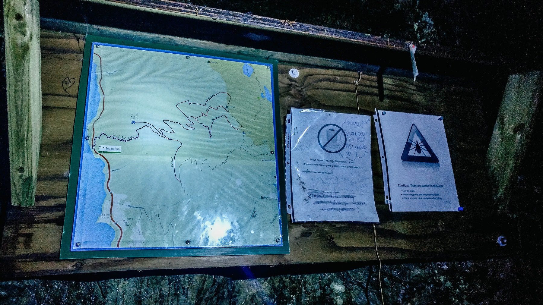 Information board for the a fresh water stream along the Tunnel Bluffs point trail