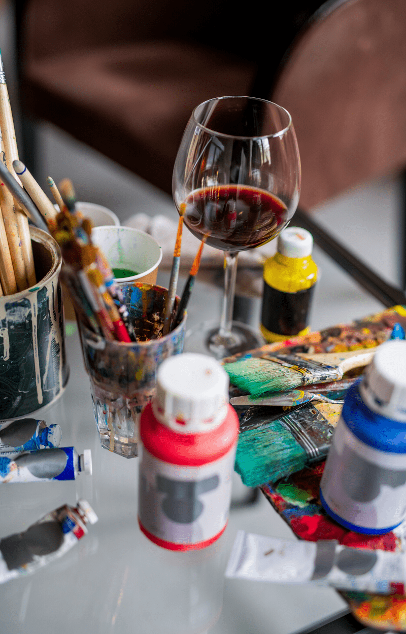 glass of wine and paint