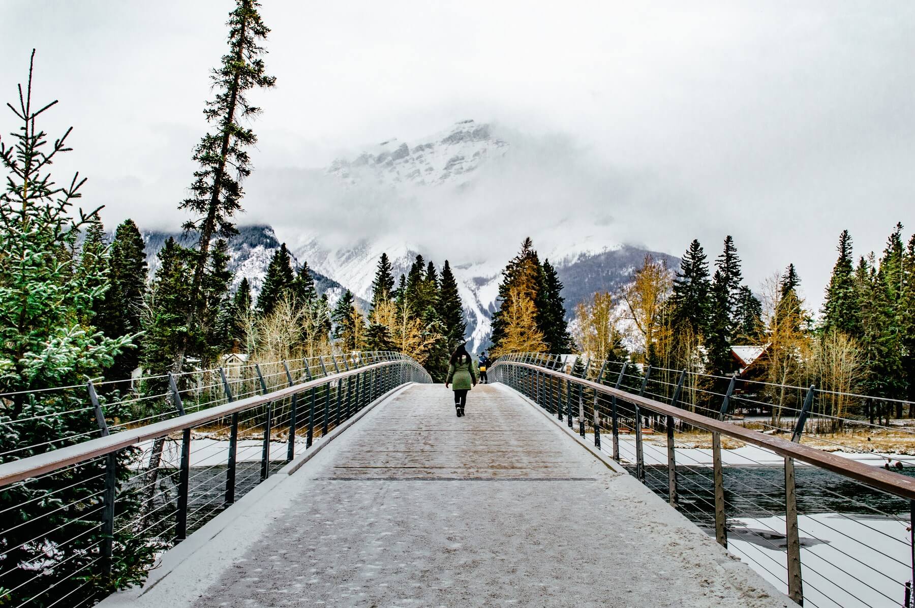 Walking across the bridge in Banff